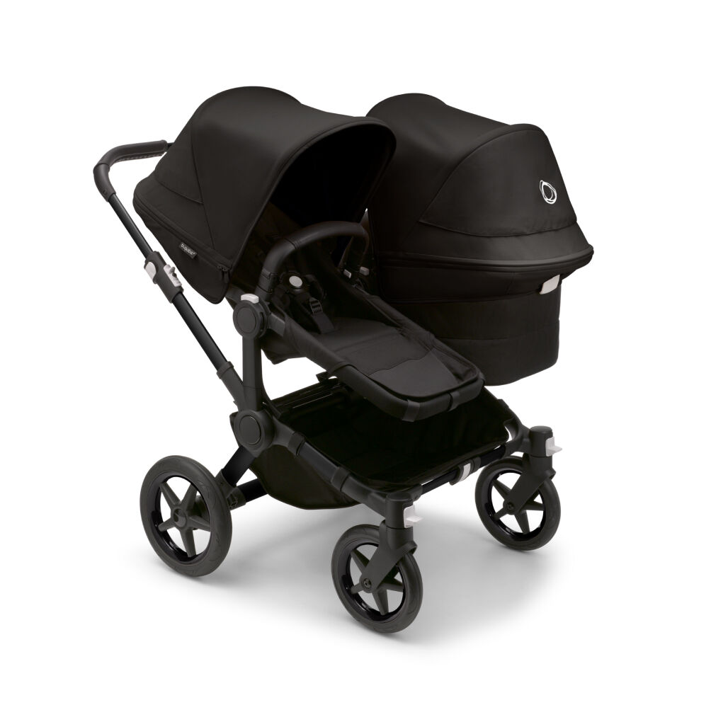 The Bugaboo Donkey 5 with Black fabrics in Duo configuration, featuring a seat and a bassinet side by side.