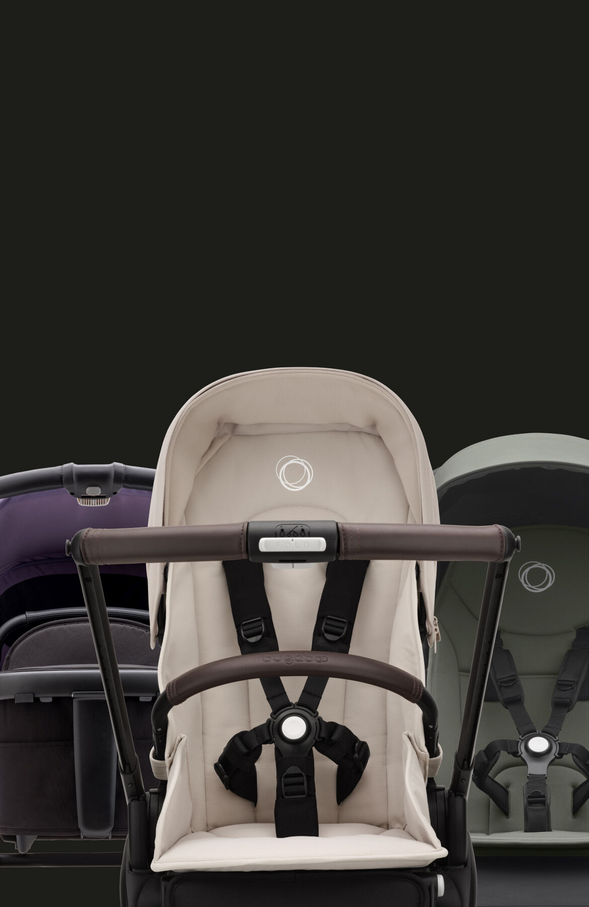 A lineup of a Bugaboo Dragonfly in Misty White fabrics, a Bugaboo Fox 5 in Astro Purple sun canopy, and a Bugaboo Butterfly in Forest Green fabrics