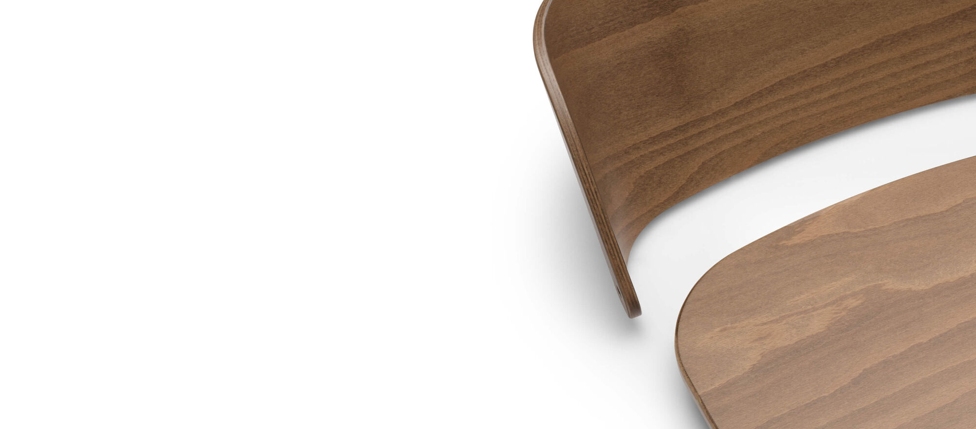 A detached backrest and seat of the Bugaboo Giraffe chair, made of natural wood with a polished, high-quality finish.