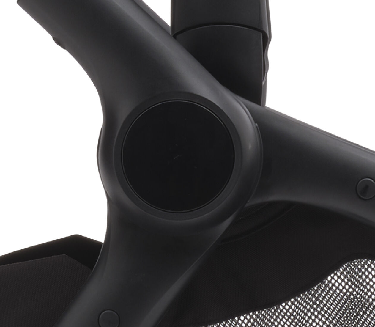  Close up on a Bugaboo stroller's chassis with a sleek finish and a matte, black central button.