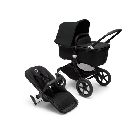 Bugaboo Fox 3 bassinet and seat stroller with black frame, black fabrics, and black sun canopy. - view 1