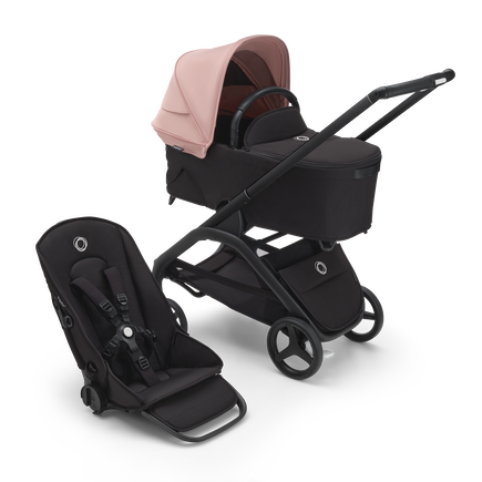 Bugaboo Dragonfly bassinet and seat stroller with black chassis, midnight black fabrics and morning pink sun canopy. - view 1
